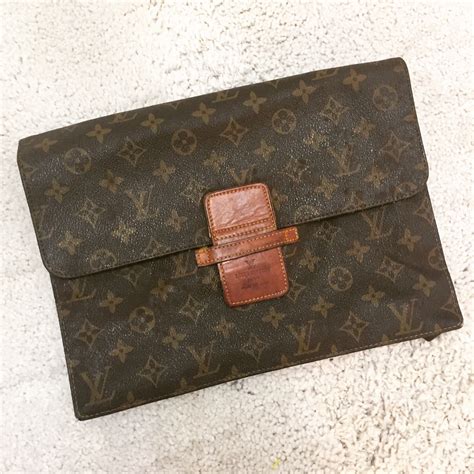 lv clutch vintage|Lv clutch women.